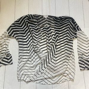 Women’s black and white blouse.